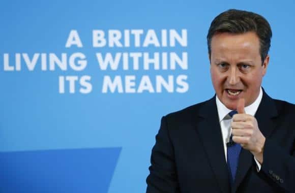 Britain's Prime Minister David Cameron gestures as he delivers a speech on the economy, in Nottingham
