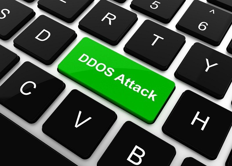 DDOS Attack on Red Button on Black Computer Keyboard.