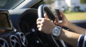 uk handheld driving ban loophole